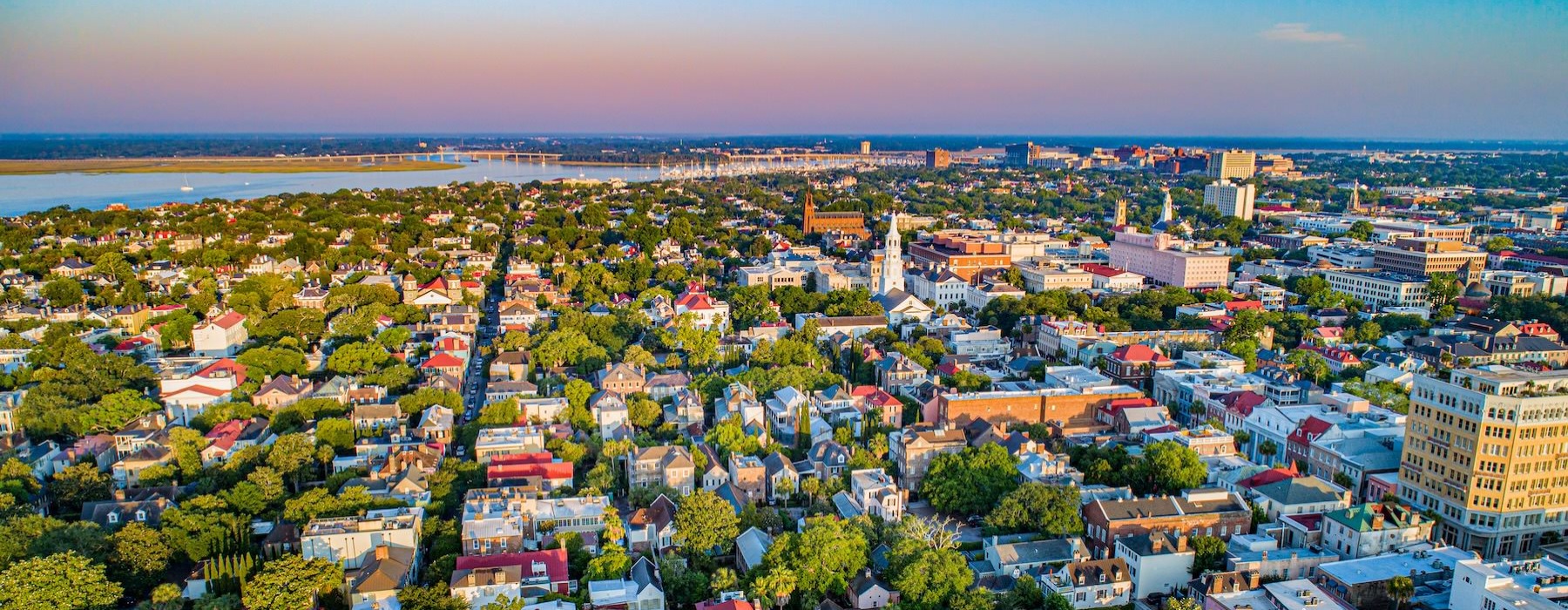 a city with many trees and buildings