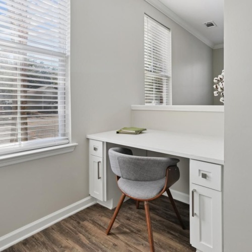 a room with a desk and chair